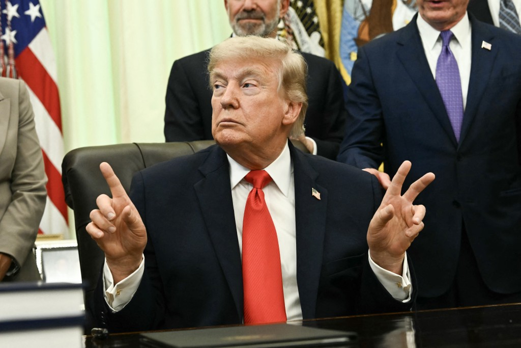 US President Donald Trump speaks before signing a proclamation in the Oval Office of the White House in Washington, DC, on June 11, 2026. (AFP)