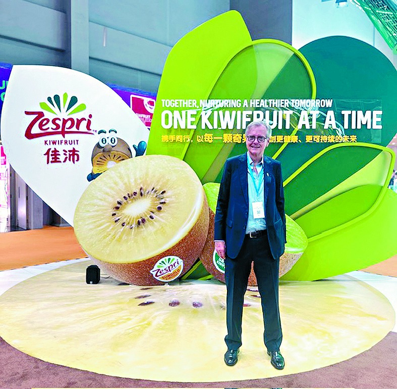 Peter Lund stands before a display showcasing New Zealand’s largest apple marketer and Zespri kiwifruit at AsiaWorld-Expo during the 2025 Asia Fruit Logistica in Hong Kong.