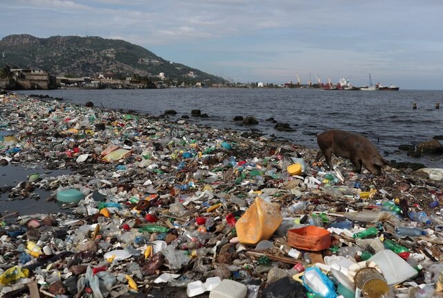 FILE PHOTO: Plastic and other debris are seen on the shores of Cap Haitian beach, in Cap Haitian, Haiti October 9, 2018. REUTERS/Ricardo Rojas