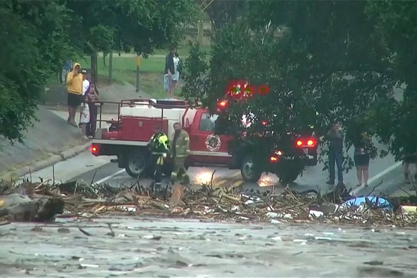 First responders survey rising flood waters of the Guadalupe River after flash flooding in Kerr County, Texas, U.S. July 4, 2025 in a still image from video. ABC Affiliate KSAT via REUTERS