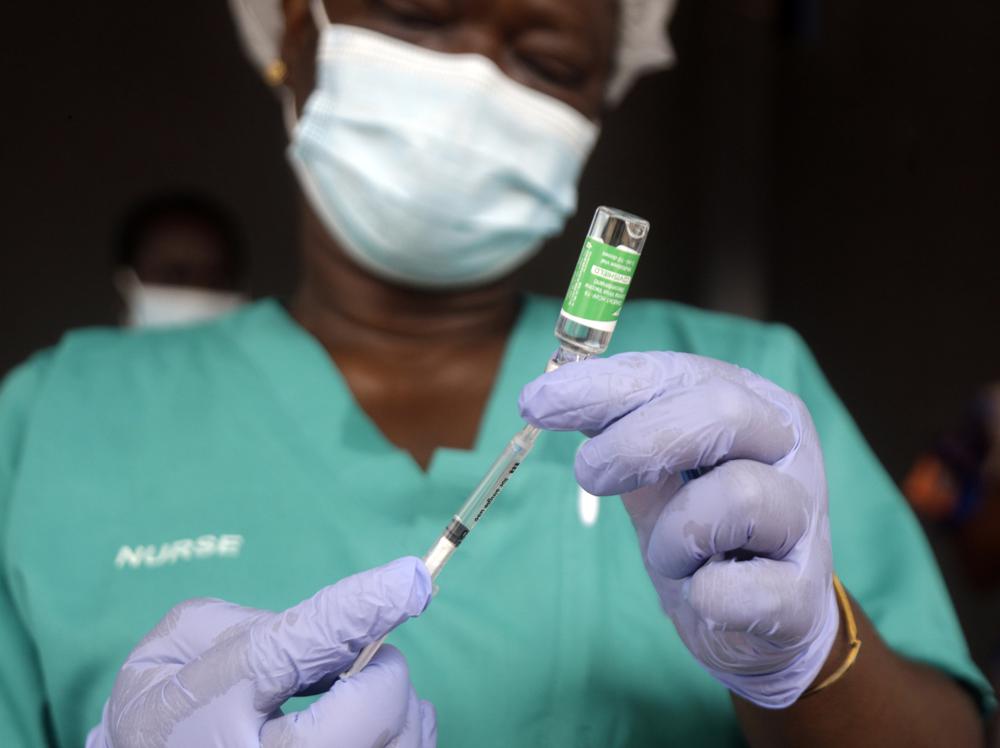- In this Friday, March 12, 2021 file photo, a nurse prepare one of the country's first coronavirus vaccinations, using the AstraZeneca vaccine manufactured by the Serum Institute of India and provided through the global COVAX initiative, at Yaba Mainland hospital in Lagos, Nigeria. - In this Friday, March 12, 2021 file photo, a nurse prepare one of the country's first coronavirus vaccinations, using the AstraZeneca vaccine manufactured by the Serum Institute of India and provided through the global COVAX initiative, at Yaba Mainland hospital in Lagos, Nigeria.