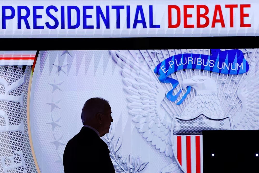 Democrat presidential candidate U.S. President Joe Biden walks offstage during a commercial break during a debate with Republican presidential candidate former U.S. President Donald Trump, in Atlanta, Georgia, U.S., June 27, 2024. REUTERS/Brian Snyder/File Photo Democrat presidential candidate U.S. President Joe Biden walks offstage during a commercial break during a debate with Republican presidential candidate former U.S. President Donald Trump, in Atlanta, Georgia, U.S., June 27, 2024. REUTERS/Brian Snyder/File Photo