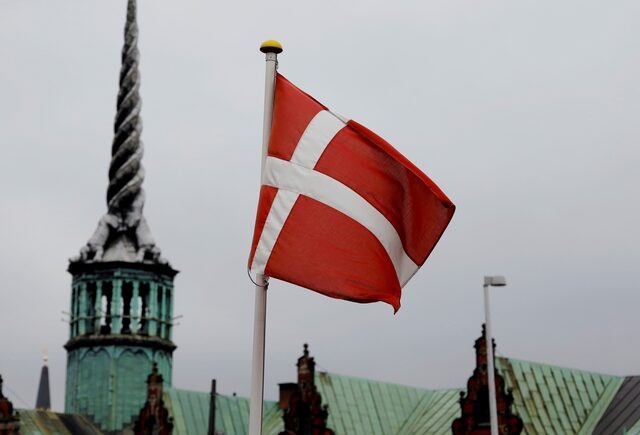 Denmark's national flag flutters in Copenhagen, Denmark, October 22, 2019. REUTERS/Andreas Mortensen/File Photo