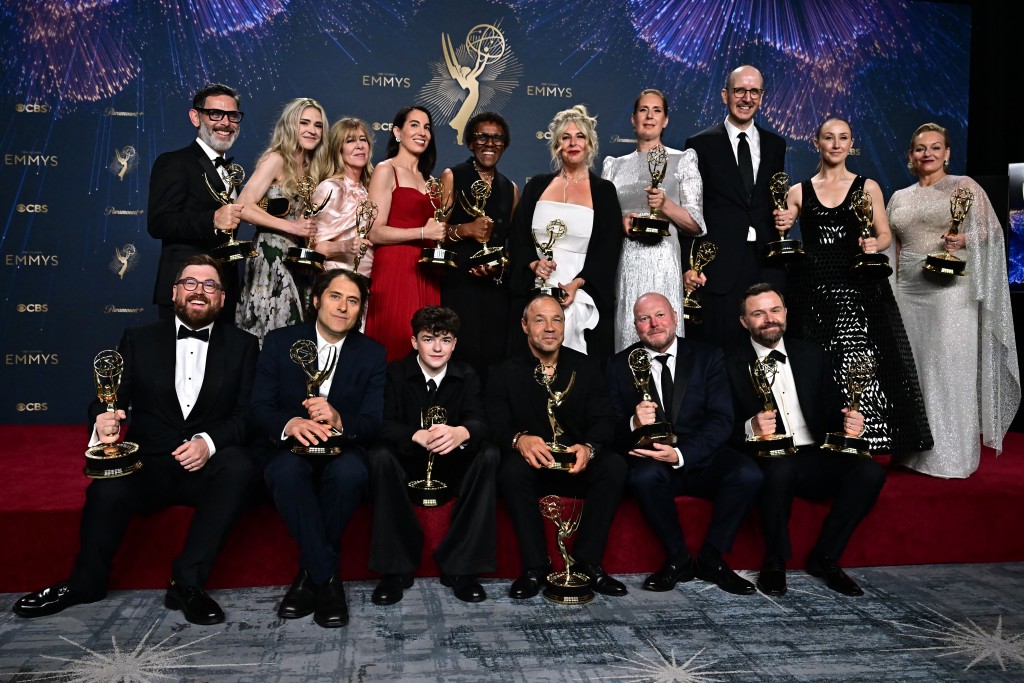 British actor Stephen Graham, British actor Owen Cooper, British actress Erin Doherty, British actress Christine Tremarco, British writer and producer Jack Thorne, British director and producer Philip Barantini, US prodicer Jeremy Kleiner and cast and crew of "Adolescence" pose in the press room during the 77th Primetime Emmy Awards at the Peacock Theatre at LA Live in Los Angeles on September 14, 2025. (AFP)