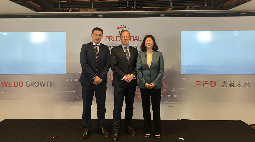 James Turner with regional CFO Ben Bulmer, left, and chief executive of insurance Lilian Ng. James Turner with regional CFO Ben Bulmer, left, and chief executive of insurance Lilian Ng.
