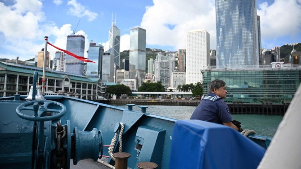 A view of Hong Kong island from an old slow passenger ferry as it docks at Central pier.  AFP