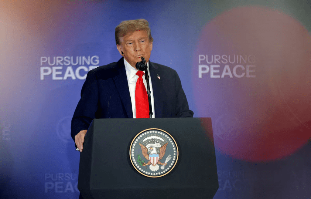 U.S. President Donald Trump holds a press conference with Russian President Vladimir Putin following their meeting to negotiate an end to the war in Ukraine, at Joint Base Elmendorf-Richardson in Anchorage, Alaska, U.S., August 15, 2025. REUTERS/Jeenah Moon