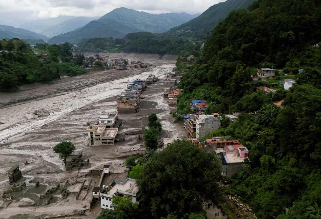 A drove view of mud covered properties following a flash flood at Trishuli in Nuwakot district, Nepal, August 26, 2026. (Reuters)