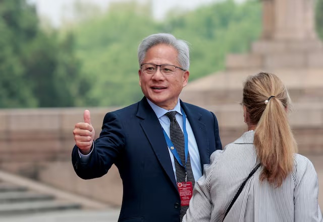 Jensen Huang, Founder, President and CEO of Nvidia gestures as he leaves the Great Hall of the People in Beijing, China, May 14, 2026. REUTERS/Evan Vucci