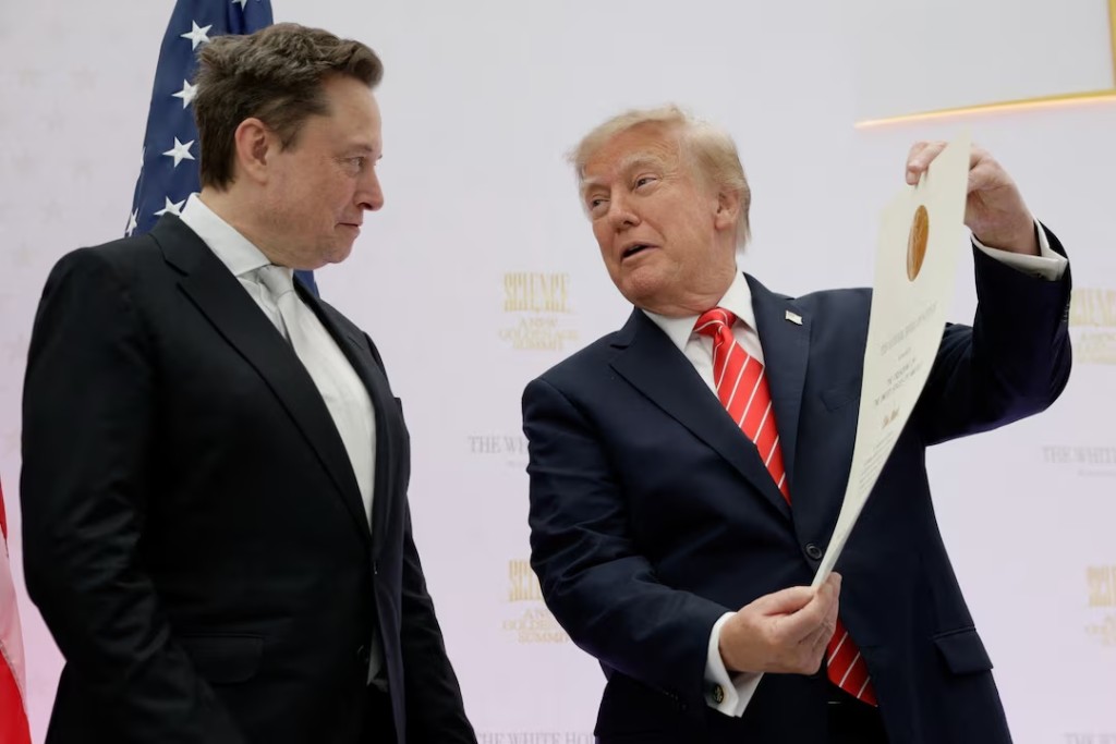 US President Donald Trump presents the National Medal of Science to Tesla and SpaceX CEO Elon Musk during the "A New Golden Age" summit at the US Institute of Peace, renamed The Donald J. Trump Institute of Peace by the Trump administration, in Washington, DC, US, October 8, 2026. REUTERS/Evan Vucci