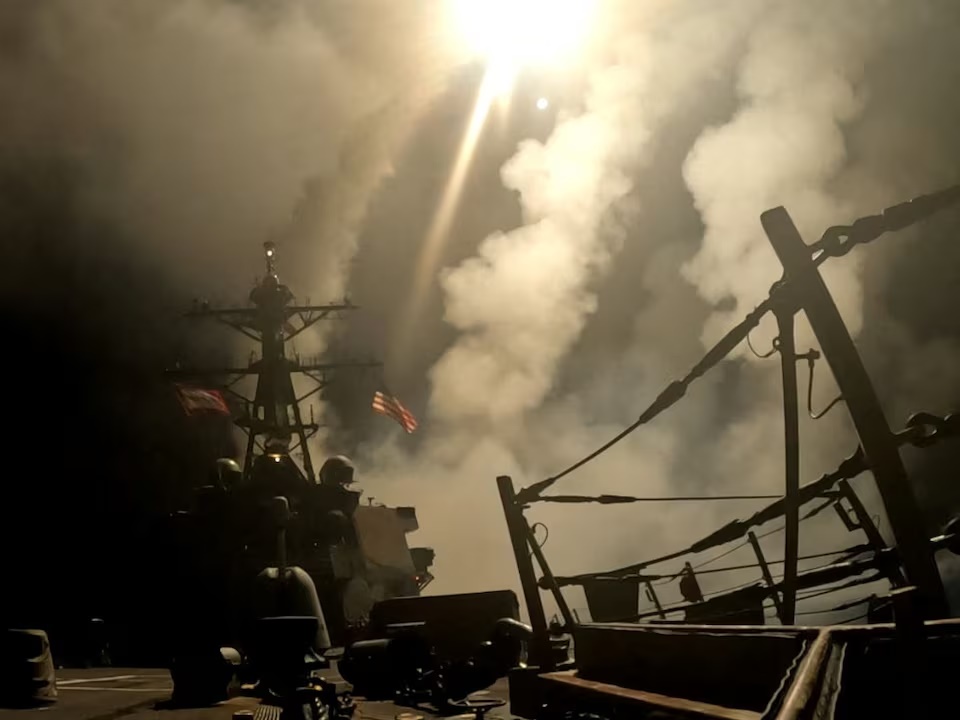 A ship fires missiles at an undisclosed location, after U.S. President Donald Trump launched military strikes against Yemen's Iran-aligned Houthis on Saturday over the group's attacks against Red Sea shipping, in this screengrab obtained from a handout video released on March 15, 2025. (Reuters) A ship fires missiles at an undisclosed location, after U.S. President Donald Trump launched military strikes against Yemen's Iran-aligned Houthis on Saturday over the group's attacks against Red Sea shipping, in this screengrab obtained from a handout video released on March 15, 2025. (Reuters)