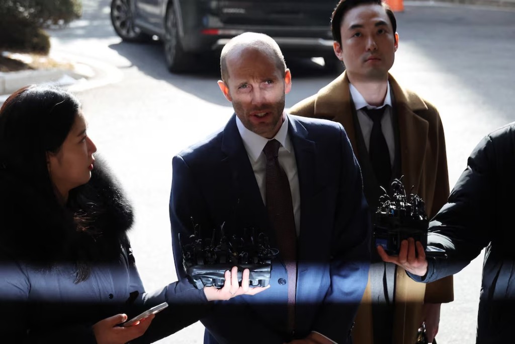 Interim CEO of Coupang's South Korean business Harold Rogers speaks before the media upon his arrival to attend police's questioning over a massive leak of local customer data at Seoul Metropolitan Police Agency in Seoul, South Korea, January 30, 2026. REUTERS/Kim Hong-Ji