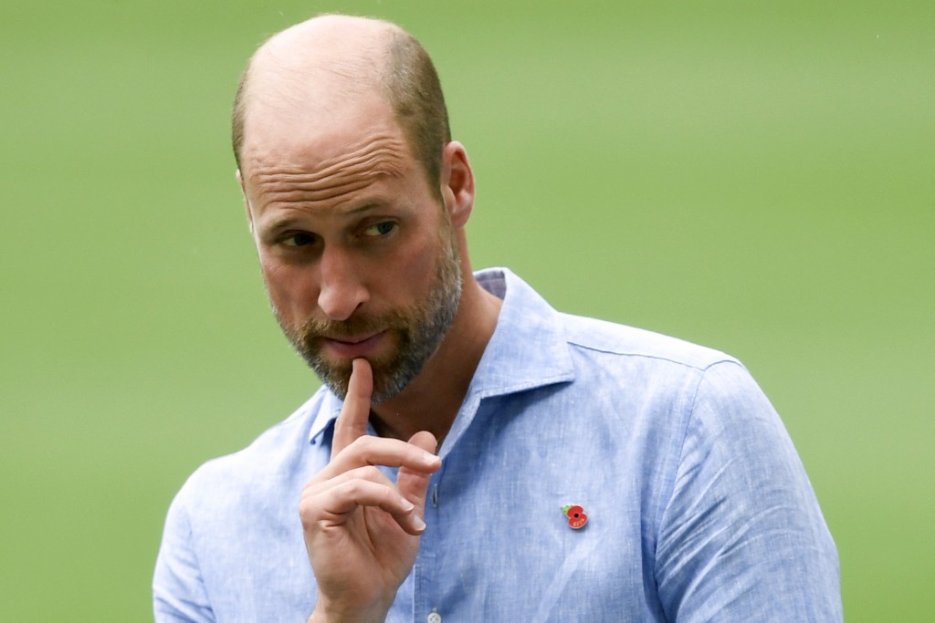 Photo by DANIEL RAMALHO / AFP  Britain’s Prince William, Prince of Wales, gestures during the “Community Football” event with children who are part of social projects, at Maracana Stadium in Rio de Janeiro on November 3, 2025.