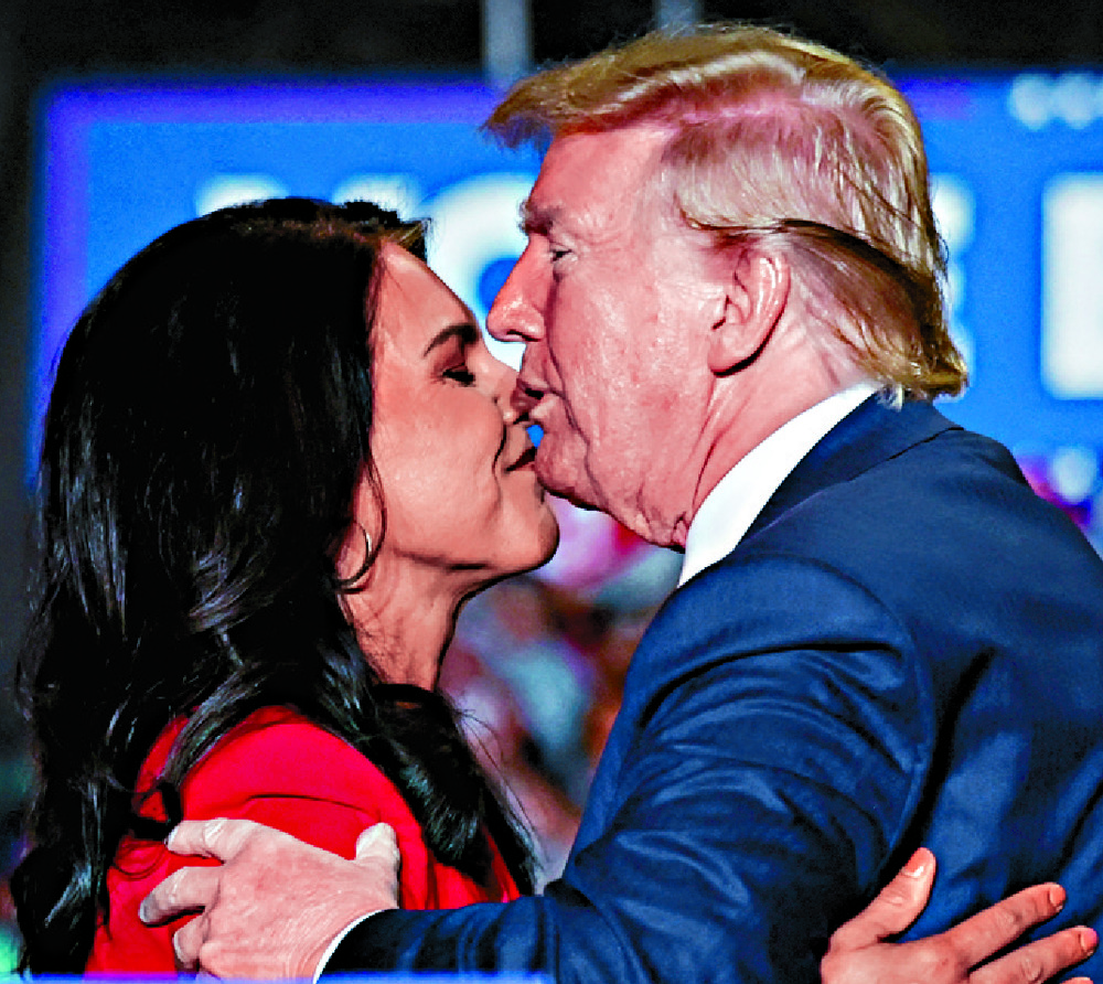 Tulsi Gabbard embraces Donald Trump last month, four years after seeking the Democratic Party presidential nomination. REUTERS Tulsi Gabbard embraces Donald Trump last month, four years after seeking the Democratic Party presidential nomination. REUTERS