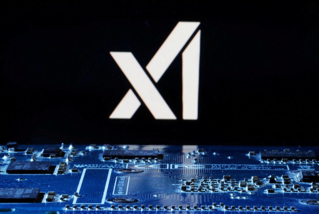 xAI logo is seen near computer motherboard in this illustration taken January 8, 2024. REUTERS/Dado Ruvic/Illustration