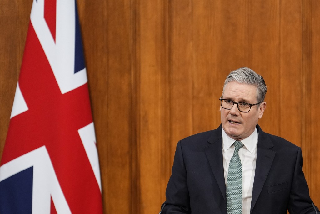 Photo by JORDAN PETTITT / POOL / AFP  Britain's Prime Minister Keir Starmer delivers a statement in the media briefing room at 9 Downing Street in central London on January 19, 2026.