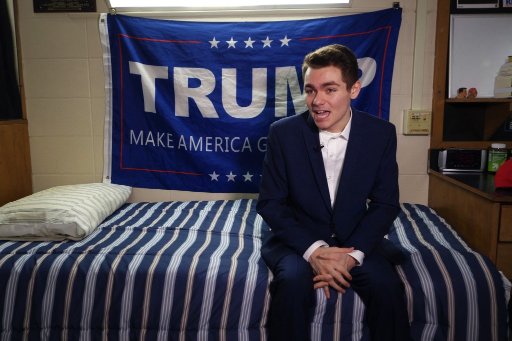 Photo by WILLIAM EDWARDS / AFP Conservative student and supporter of US President Donald Trump, Nick Fuentes, answers question during an interview with Agence France-Presse in Boston, Massachusetts, on May 9, 2017.