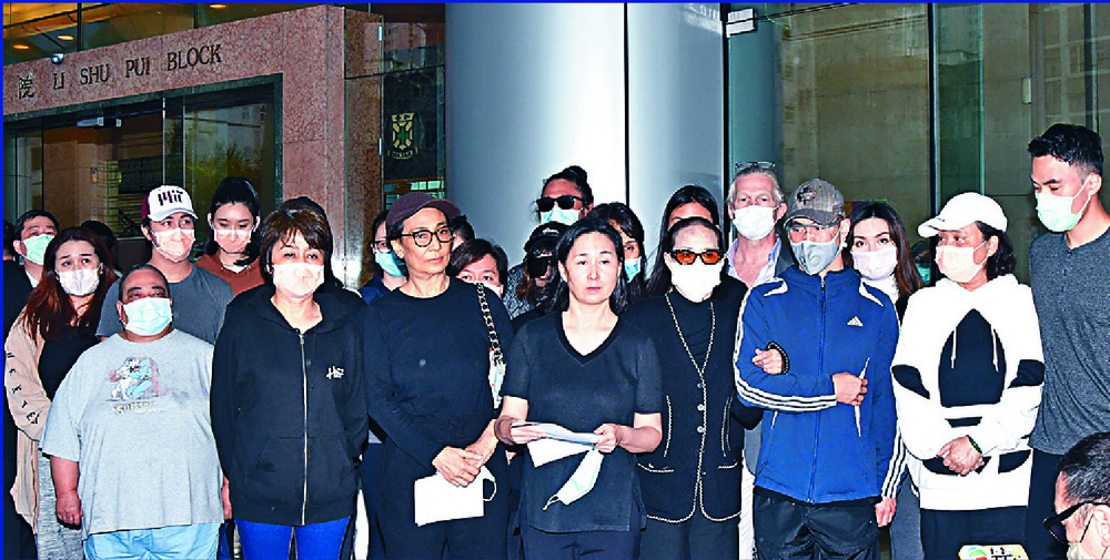 Family members of Stanley Ho, led by Pansy Ho, center, speak about his passing to the media outside the Hong Kong Sanatorium and Hospital. SING TAO