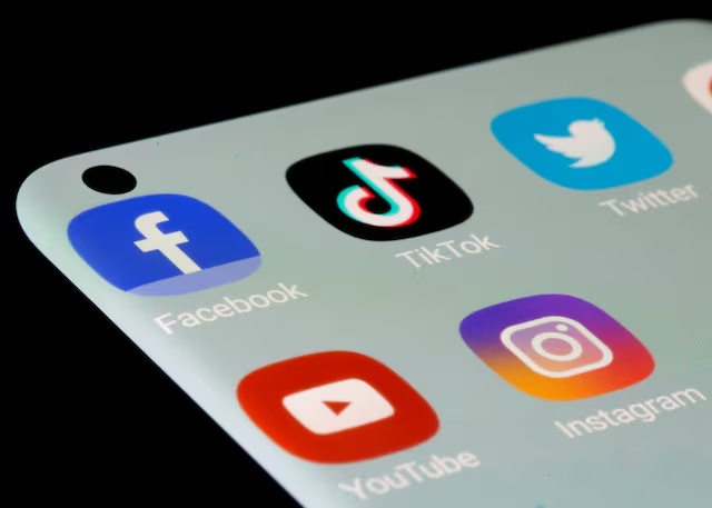 Facebook, TikTok, Twitter, YouTube and Instagram apps are seen on a smartphone in this illustration taken, July 13, 2021. REUTERS/Dado Ruvic/Illustration/File Photo