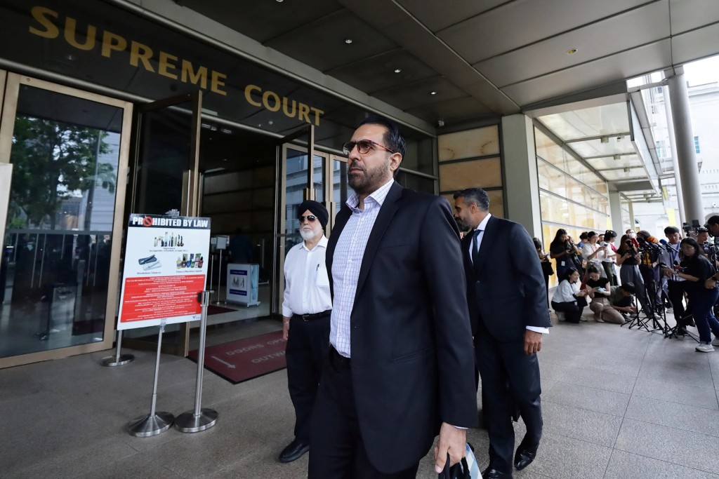 Leader of the Opposition Pritam Singh leaves the Supreme Court after his appeal was dismissed in Singapore 4 Dec, 2025. (PHOTO: REUTERS/Suhaimi Abdullah)