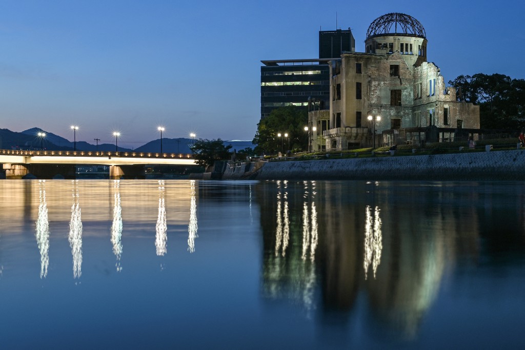 A general view of the Atomic Bomb Dome (R) at dusk in the centre of Hiroshima, Hiroshima prefecture. (AFP)
