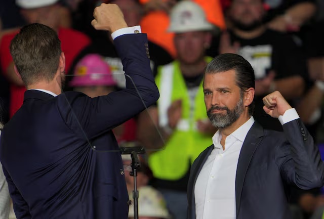 Donald Trump Jr and Eric Trump at a presidential campaign rally in Pittsburgh, Pennsylvania, U.S., November 4, 2024. REUTERS/Jeenah