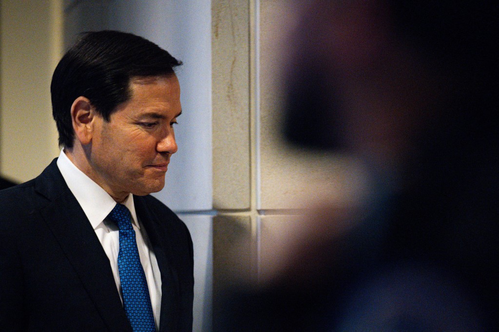 U.S. Secretary of State Marco Rubio enters a meeting with members of Congress on the Caribbean boat strikes, on Capitol Hill in Washington, D.C., U.S., December 9, 2025. REUTERS/Annabelle Gordon