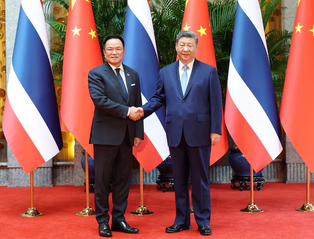 Chinese President Xi Jinping and Thailand's Prime Minister Anutin Charnvirakul shake hands as they meet on the sidelines of the World Artificial Intelligence Conference (WAIC) in Shanghai, China July 17, 2026. China Daily via REUTERS/File Photo