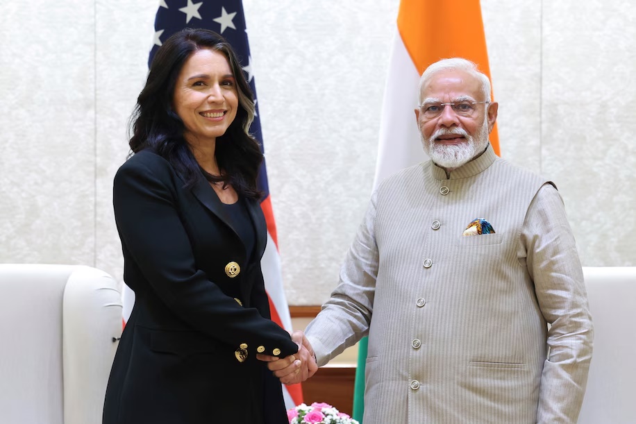 United States Director of National Intelligence Tulsi Gabbard, left, shakes hand with Indian Prime Minister Narendra Modi during a meeting in New Delhi, India, Monday, March 17, 2025. (Government of India Press Information Bureau via AP) (Uncredited/Government of India Press Information Bureau) United States Director of National Intelligence Tulsi Gabbard, left, shakes hand with Indian Prime Minister Narendra Modi during a meeting in New Delhi, India, Monday, March 17, 2025. (Government of India Press Information Bureau via AP) (Uncredited/Government of India Press Information Bureau)