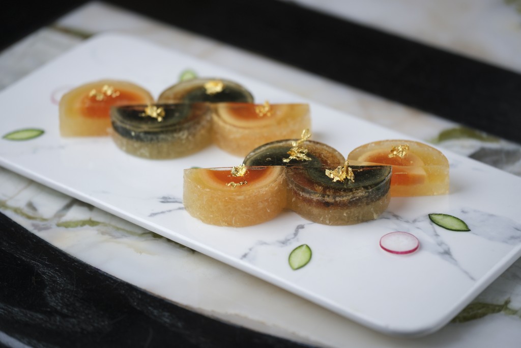 Crystal century egg with gold leaf and preserved ginger.