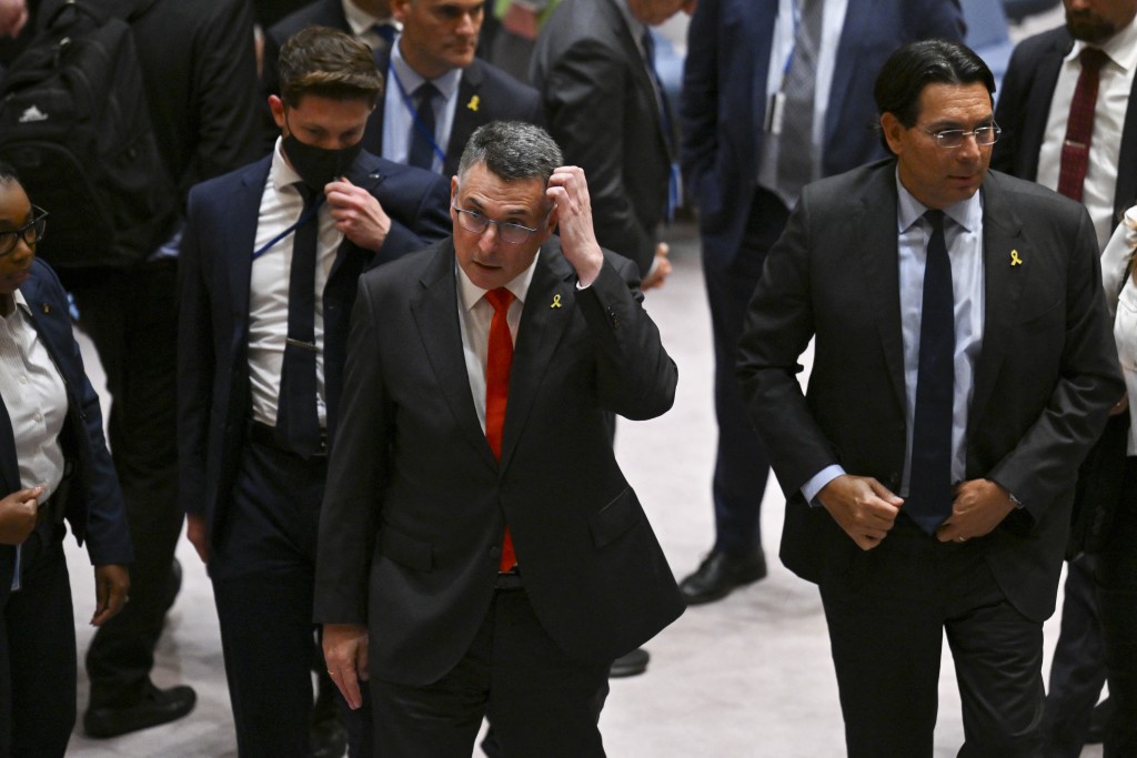Israel's Foreign Minister Gideon Sa'ar (C) leaves after a United Nations Security Council meeting on the conflict in the Middle East, including the Palestinian question, at United Nations headquarters on August 5, 2025 in New York. (Photo by ANGELA WEISS / AFP)
