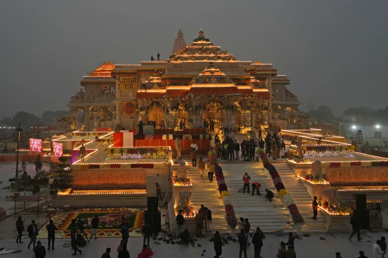 Workers decorate a temple dedicated to Hindu deity Lord Ram with flowers the day before the temple’s grand opening in Ayodhya, India, Sunday, Jan. 21, 2024. (AP Photo/Rajesh Kumar) Workers decorate a temple dedicated to Hindu deity Lord Ram with flowers the day before the temple’s grand opening in Ayodhya, India, Sunday, Jan. 21, 2024. (AP Photo/Rajesh Kumar)
