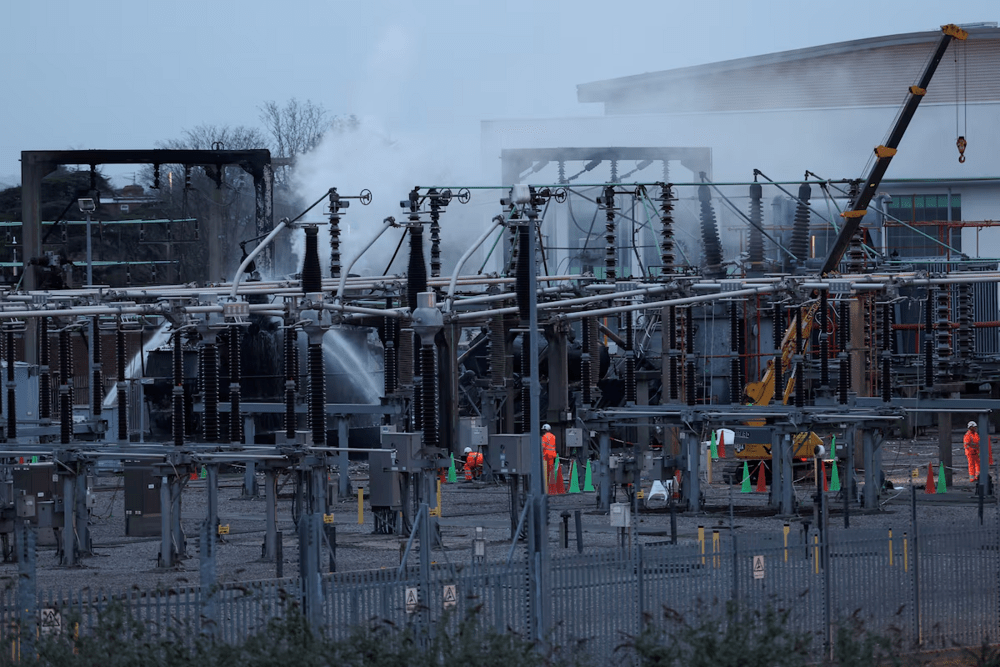 People work at an electrical substation, after a fire there wiped out the power at Heathrow International Airport, in Hayes, London, Britain, March 21, 2025. REUTERS/Isabel Infantes People work at an electrical substation, after a fire there wiped out the power at Heathrow International Airport, in Hayes, London, Britain, March 21, 2025. REUTERS/Isabel Infantes