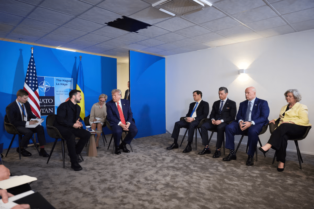 U.S. President Donald Trump and Ukraine's President Volodymyr Zelenskiy attend a meeting on the sidelines of NATO summit in The Hague, Netherlands June 25, 2025. Ukrainian Presidential Press Service/Handout via REUTERS/File Photo