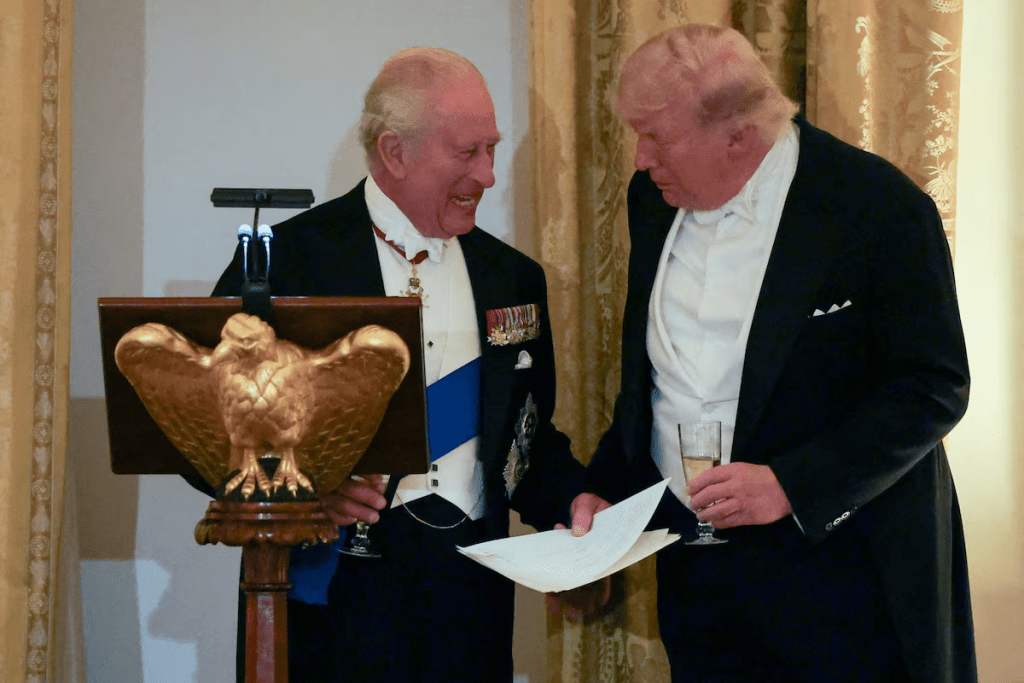 Britain's King Charles and U.S. President Donald Trump interact during a state dinner for the King and Queen Camilla at the White House in Washington, D.C., U.S., April 28, 2026. REUTERS/Suzanne Plunkett/File Photo 