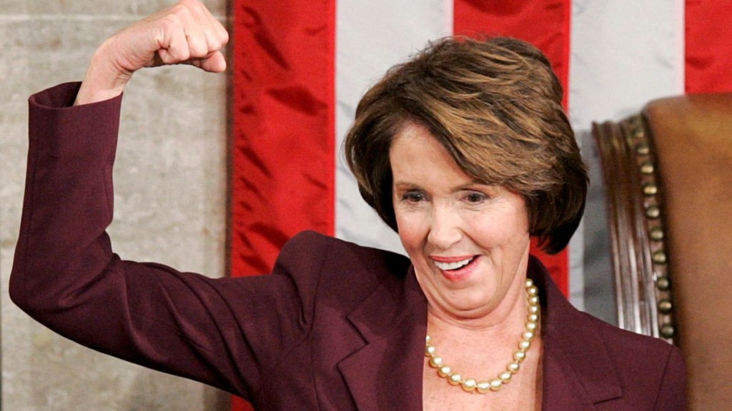 FILE PHOTO: U.S. Speaker of the House Nancy Pelosi reacts as she takes the podium for the first time after she was elected the first ever female Speaker of the U.S. House of Representatives on the first day of the 110th Congress in Washington January 4, 2007. REUTERS