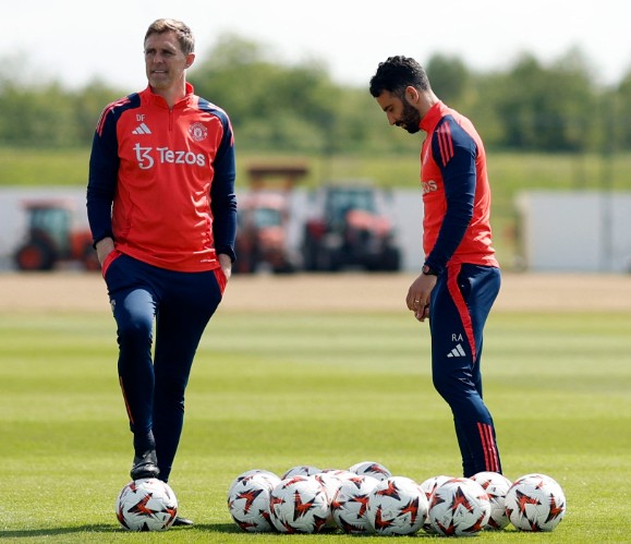 Darren Fletcher, left, with Ruben Amorim during a Manchester United training session in May. REUTERS