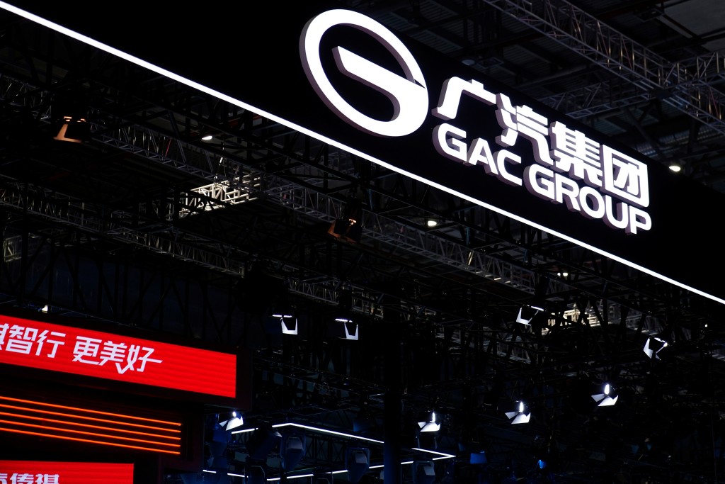 The logo of the GAC Group is seen at its booth during a media day for the Auto Shanghai show in Shanghai, China April 19, 2021. REUTERS/Aly Song