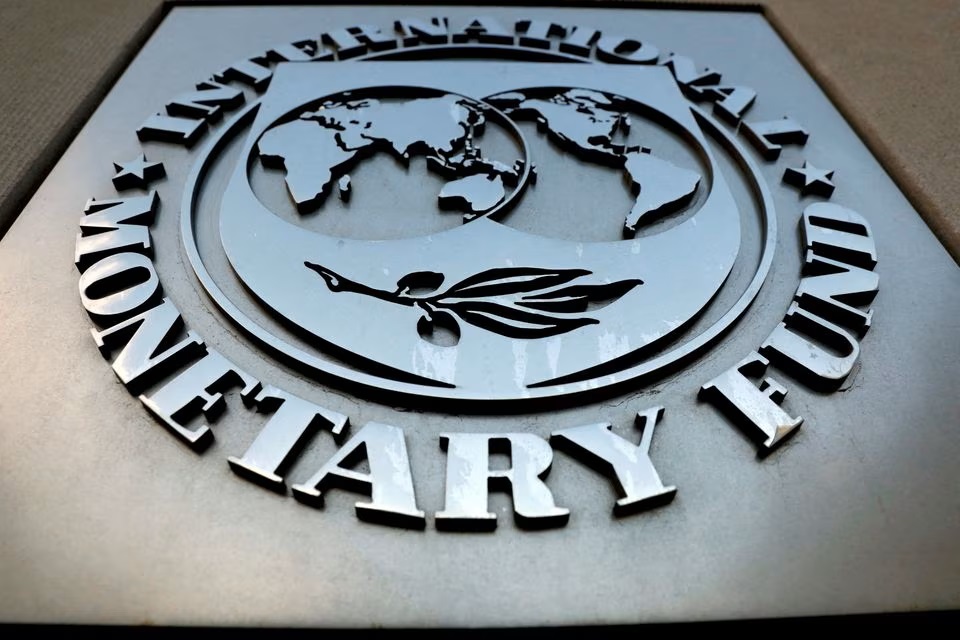 The International Monetary Fund (IMF) logo is seen outside the headquarters building in Washington, U.S. (Reuters) The International Monetary Fund (IMF) logo is seen outside the headquarters building in Washington, U.S. (Reuters)