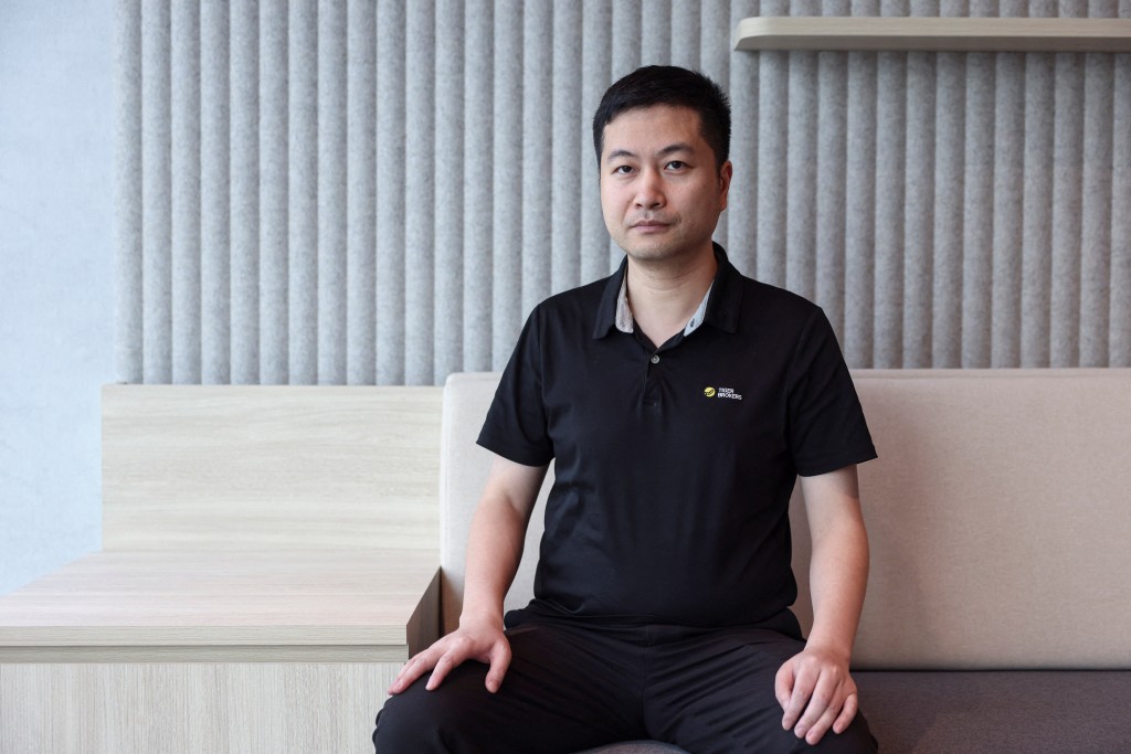 Tiger Brokers' founder and CEO Wu Tianhua poses before interview in Hong Kong, China June 2, 2025. REUTERS