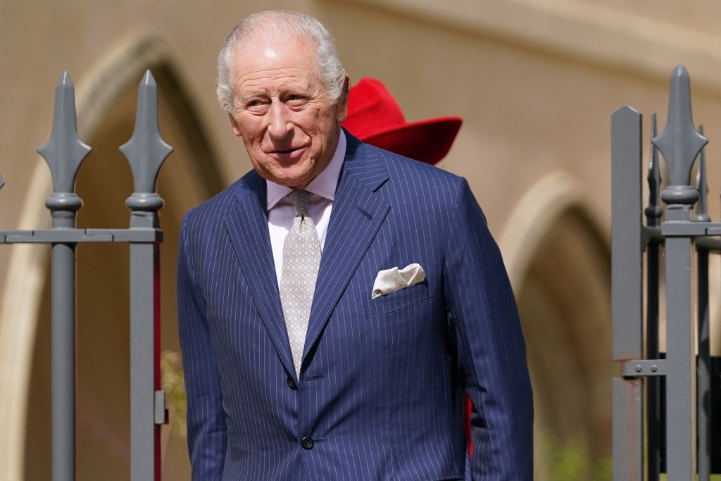 Britain's King Charles III and Britain's Queen Camilla leave St George's Chapel, in Windsor, west of London, after attending the Easter Matins Service, on April 5, 2026. (Photo by Alberto Pezzali / POOL / AFP)