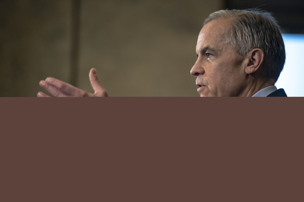Photo by ANDREJ IVANOV / AFP  Canadian Prime Minister Mark Carney speaks during a press conference at the West Block on Parliament Hill in Ottawa, Ontario, Canada, on April 14, 2026.