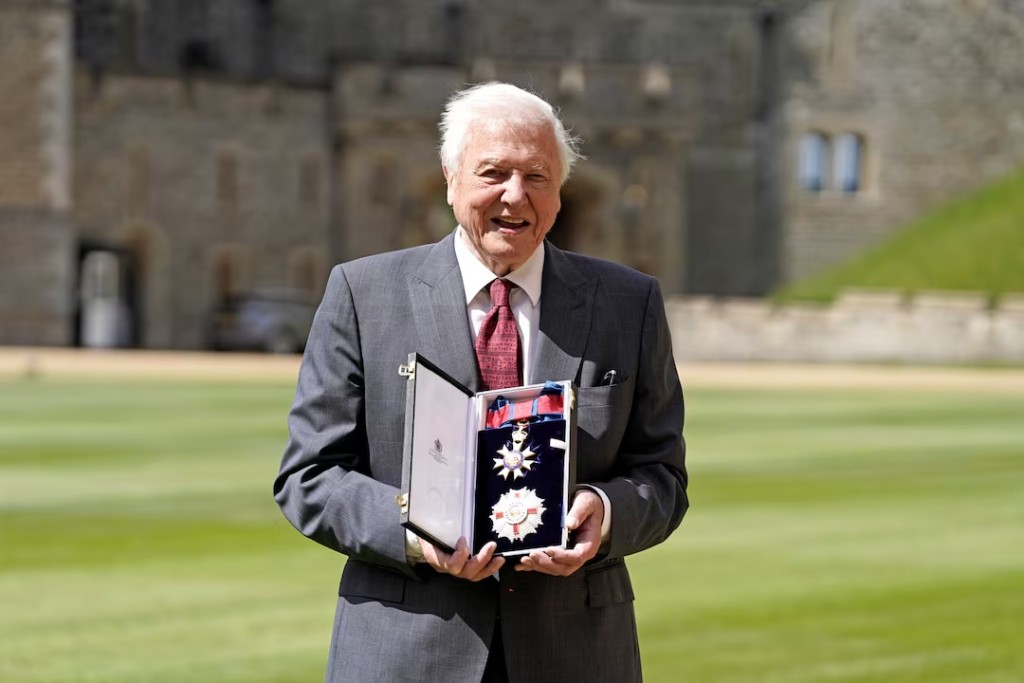 Sir David Attenborough poses for a picture after being appointed as Knight Grand Cross of the Order of St. Michael and St. George, following an investiture ceremony at Windsor Castle, Windsor, Britain June 8, 2022. Andrew Matthews/Pool via REUTERS/File Photo