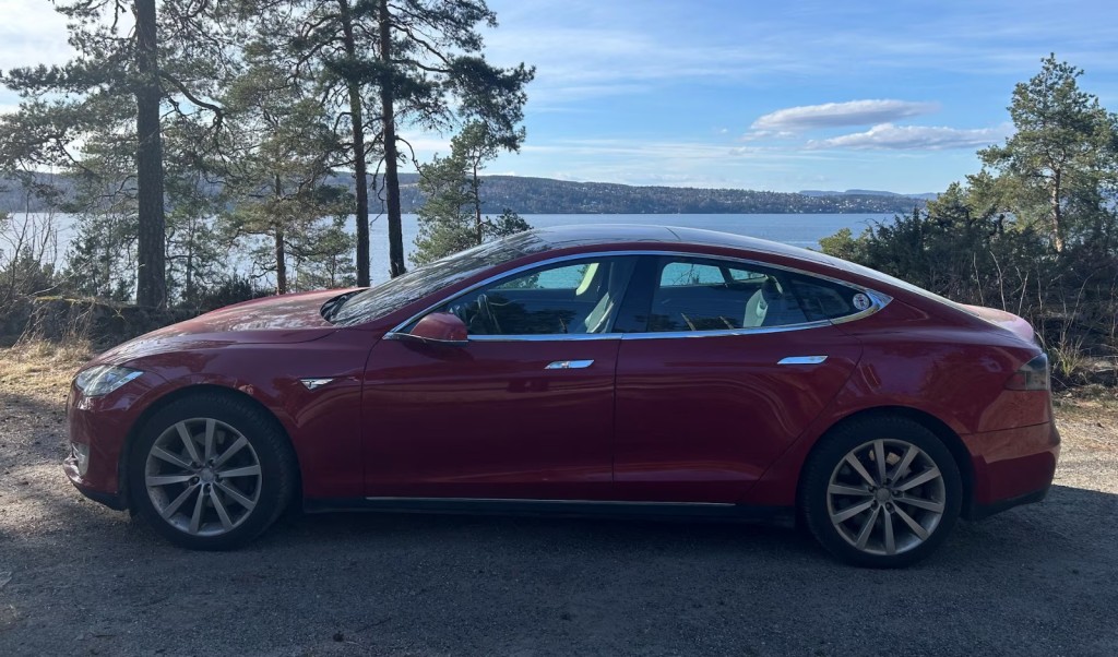 A Tesla Model S is parked in front of Oslofjorden, Oslo, Norway, April 9, 2025. REUTERS