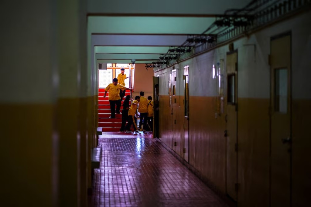 Students run to hide during a drill by police officers to prepare for an active shooter scenario, at Surasak Montri School in Bangkok, following a deadly shooting at Debsirin Nonthaburi School in Nonthaburi province, Thailand, August 19, 2026. REUTERS/Athit Perawongmetha
