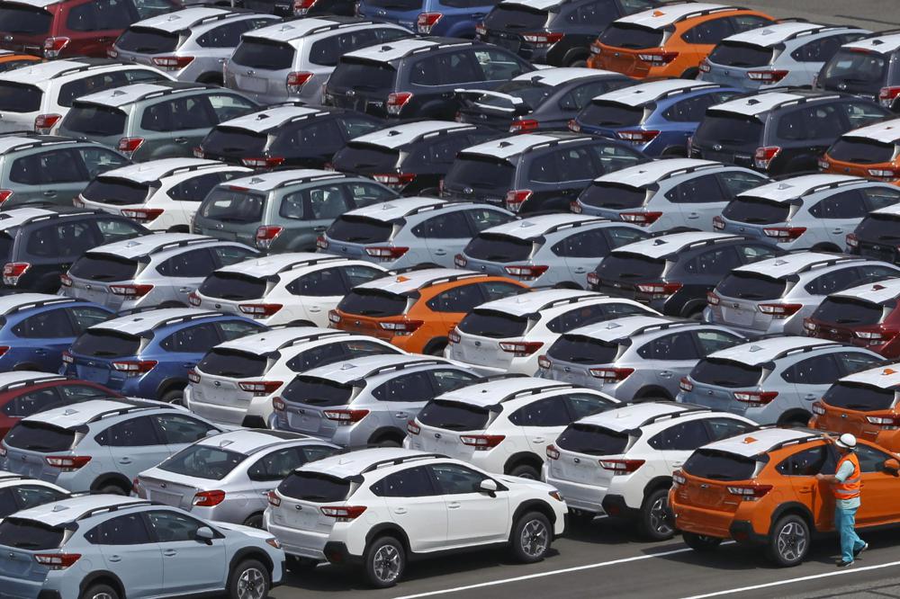 Vehicles ready for export at a port in Kawasaki, near Tokyo on August 2, 2018. Vehicles ready for export at a port in Kawasaki, near Tokyo on August 2, 2018.