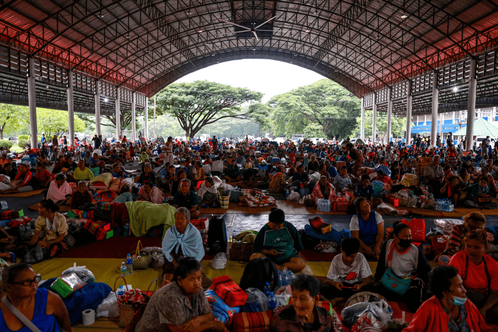 People rest inside a temporary shelter in Srisaket province, after Thailand and Cambodia exchanged heavy artillery fire for a second day on Friday as border fighting intensified and spread, while Cambodia's leader said Thailand had agreed to a Malaysian ceasefire proposal but then backed down, Thailand, July 26, 2025. REUTERS/Athit Perawongmetha