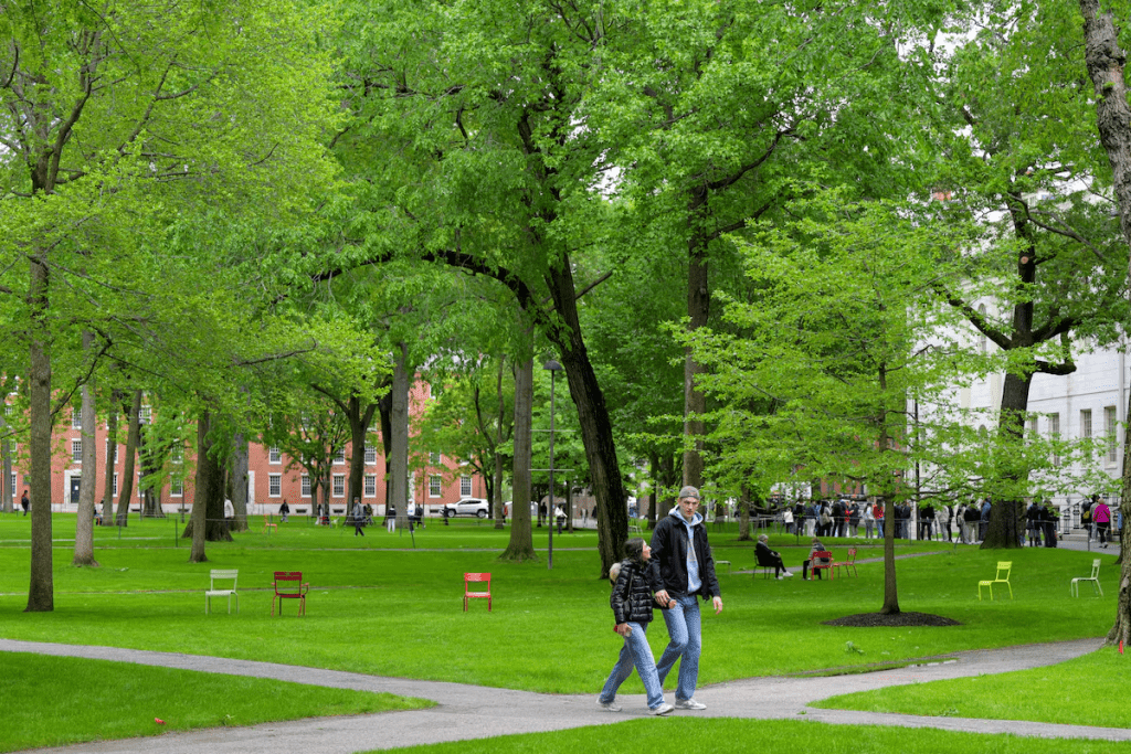Students walk on the campus of Harvard University in Cambridge, Massachusetts, U.S., May 23, 2025. REUTERS/Faith Ninivaggi/File Photo