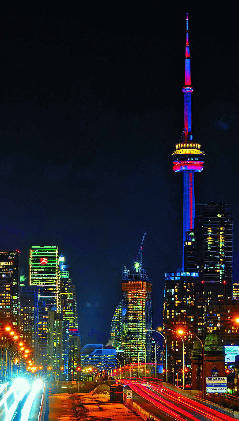Toronto’s landmark CN Tower lit up in red to mark the Lunar New Year in January. XINHUA Toronto’s landmark CN Tower lit up in red to mark the Lunar New Year in January. XINHUA