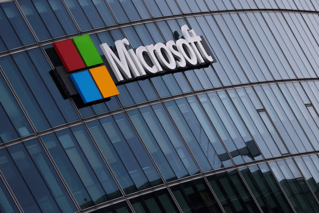 A view shows a Microsoft logo at Microsoft offices in Issy-les-Moulineaux near Paris, France, March 21, 2025. REUTERS/Gonzalo Fuentes/File Photo